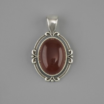 Colgante de cornalina 34×21 mm ± metal plateado