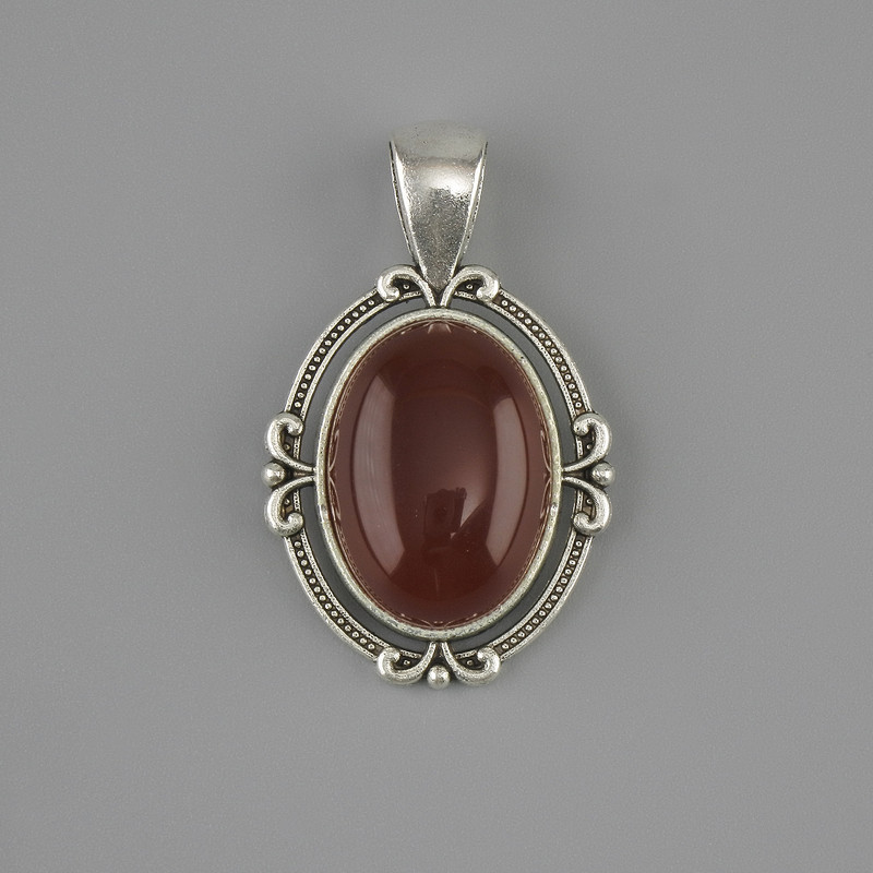 Colgante de cornalina 34×21 mm ± metal plateado