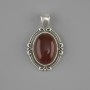 Colgante de cornalina 34×21 mm ± metal plateado