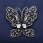 Broche Mariposa con strass gris