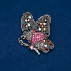 Broche «Mariposa» de metal dorado, strass multicolores 50×60 mm +