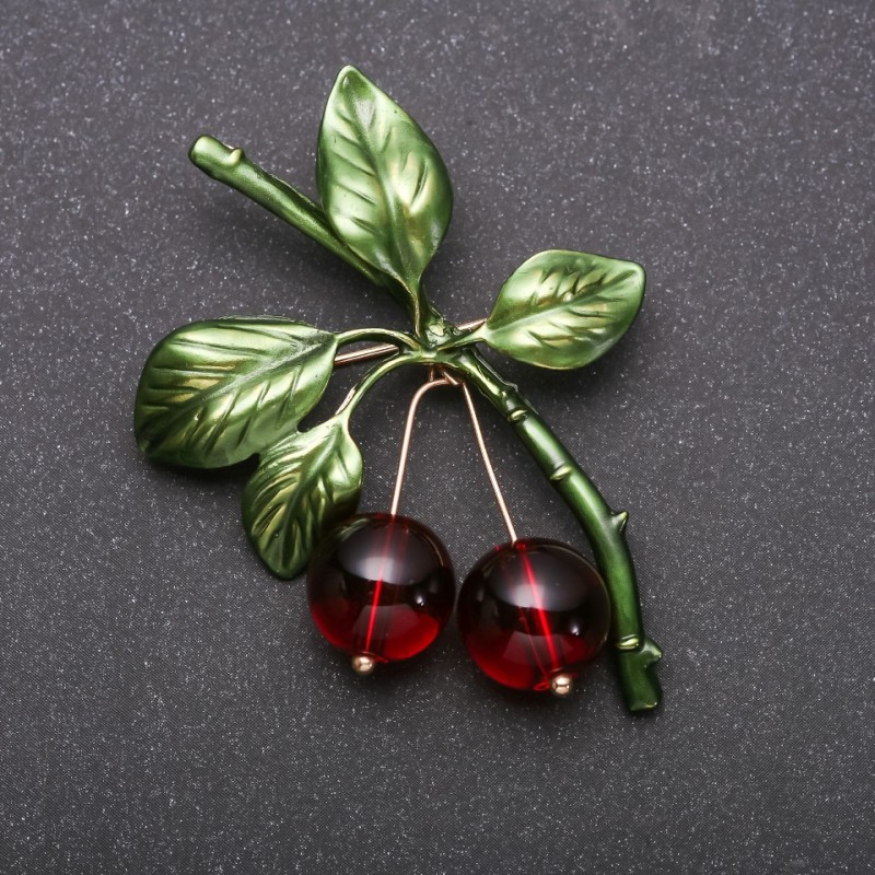 Broche Cerezas doradas 55×43 mm