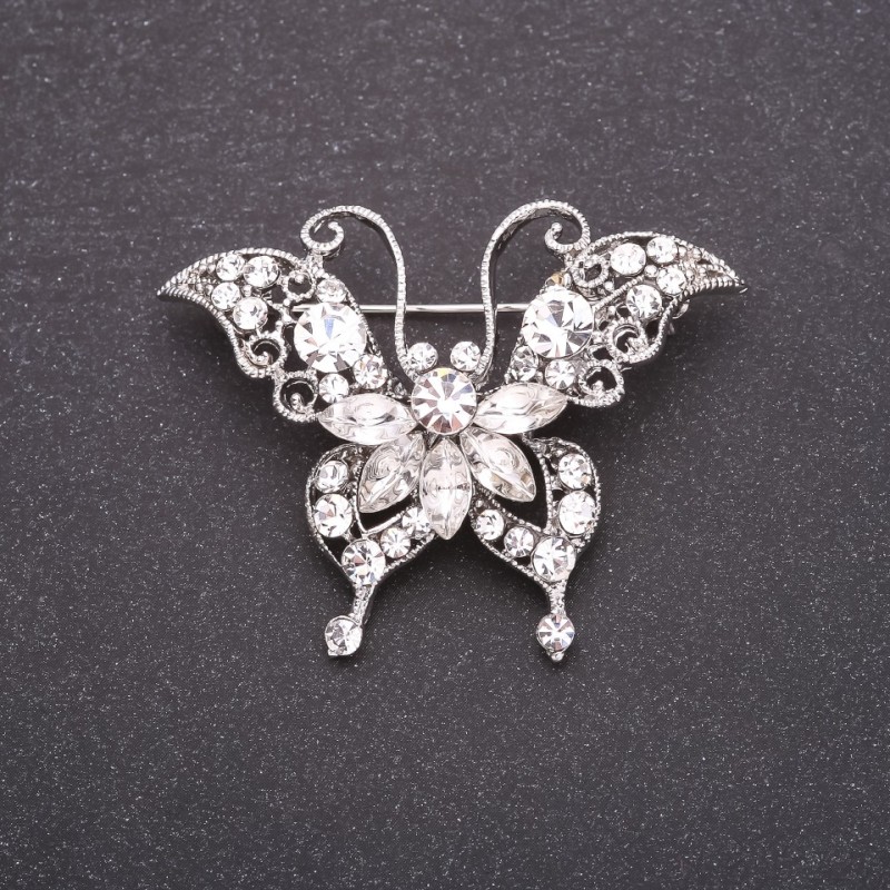 Broche de mariposa con strass blancos 40×50 mm metal blanco