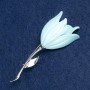 Broche Flor, esmalte azul, metal plateado 27x72 mm