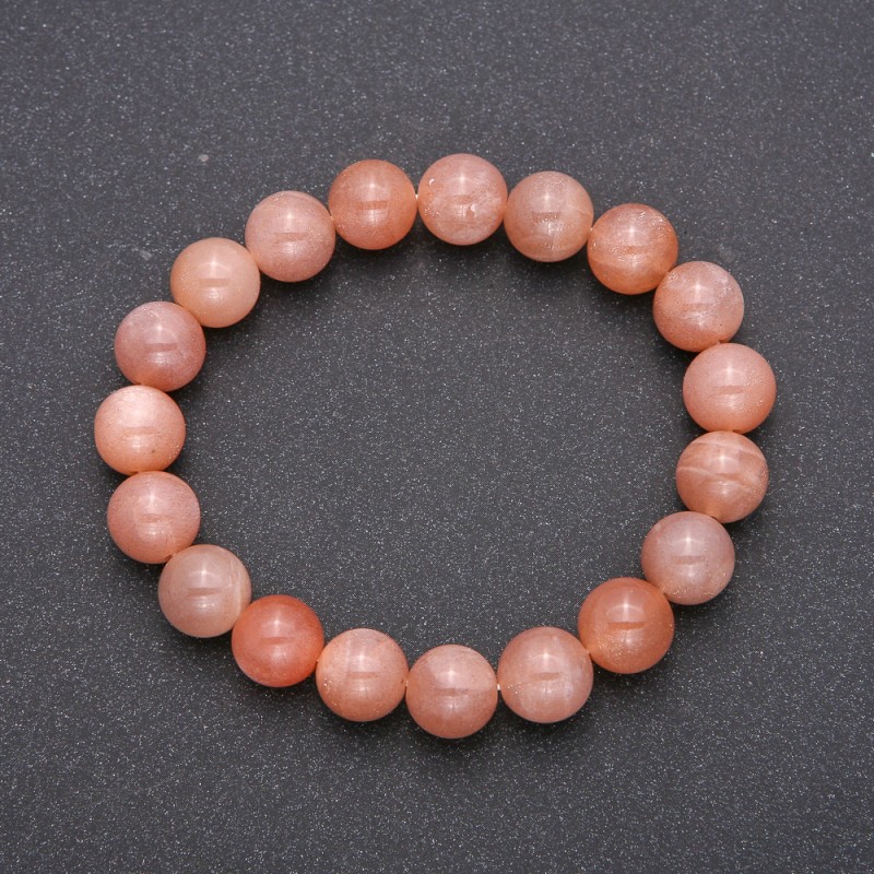 Pulsera de selenita natural con cuentas lisas